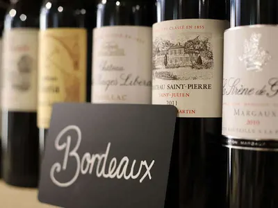 Bottles of fine Bordeaux on a shelf